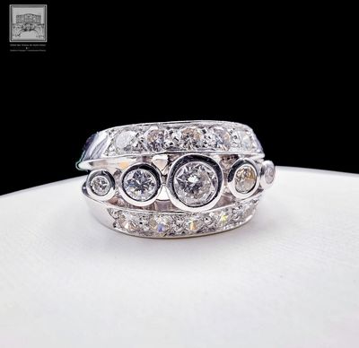 an image of a diamond ring on a white plate