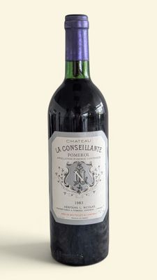 a bottle of wine that is sitting on a table