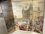a picture of a book with a picture of a castle on it