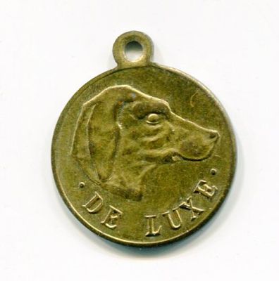 an image of a coin with a dog ' s face on it