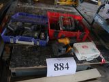 a pile of assorted tools and tools on a table