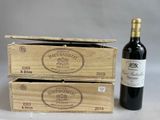 two wooden boxes with a bottle of wine next to it