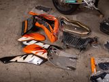 a motorcycle that has been left out on the ground