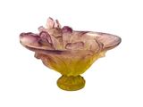a glass bowl with flowers in it on a white background
