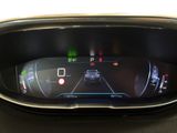 a close up of a car ' s dashboard with a digital display