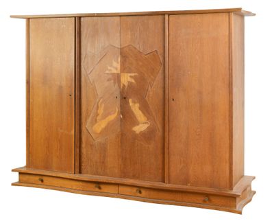 a wooden cabinet with carvings on the front of it