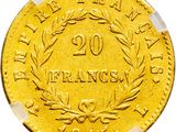 a close up of a gold coin on a white background