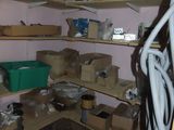 a room with a lot of boxes and boxes on the shelves