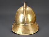 brass helmet on a gray background