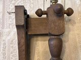 a wooden object on a table with a light on it