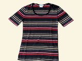 a women ' s striped t - shirt on a white background