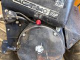 a close up of a small engine on the ground