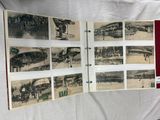 an old photo of a bunch of pictures on a table