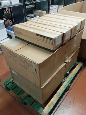 many boxes stacked on top of each other on a pallet