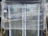 a picture of a glass door that is wrapped in plastic