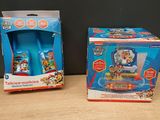 two toys that are sitting on a table next to each other