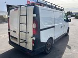 a white van that is parked in a parking lot