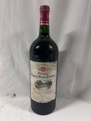 a close up of a bottle of wine on a white background