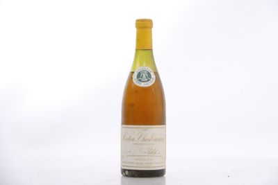 a bottle of wine that is sitting on a table