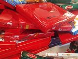 pile of assorted snacks and snacks sitting on top of a table