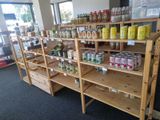 many shelves of spices and condiments in this store
