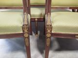 two chairs that are sitting next to each other