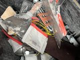 a pile of assorted items inside of a trash can