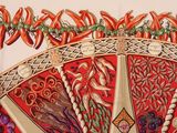 a picture of a decorative wall hanging on the wall