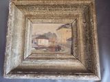 une image d'un tableau sur le mur d'une pièce