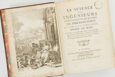 un livre sur lequel figure la photo d'un groupe de personnes