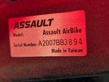 a label on the seat of a car that reads assault airbike