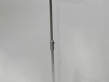 a black umbrella that is on top of a tripod