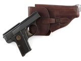 a close up of a gun and a holster on a white background