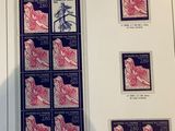 a picture of a collection of stamps on display in a book