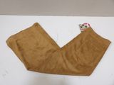 brown cordurope pants on a white surface with a cat on it