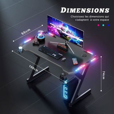 an image of a gaming desk with a monitor, keyboard and mouse