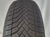 a close up of a tire on a white background