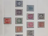 a picture of a picture of a collection of stamps in a frame