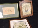 three framed pictures of flowers and a ship on a black background