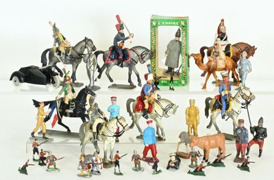 a lot of figurines that are sitting on a table