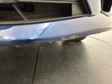 a close up view of the front bumper of a car