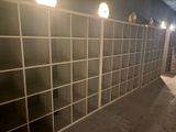 a room that has a bunch of bookshelves in it