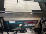 a machine that is sitting inside of a glass case