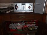 a microwave sitting on top of a cabinet in a room