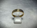 an image of a gold ring with diamonds on it