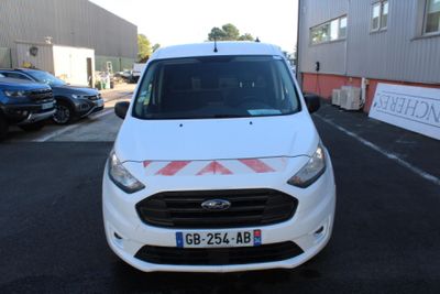 a white van that is parked in a parking lot