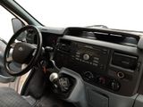 a car dashboard with a steering wheel and dashboard controls