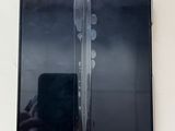 someone is taking a picture of a cell phone with a broken screen