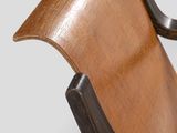 an image of a wooden chair with a black metal frame
