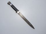 a knife that is laying on top of a table